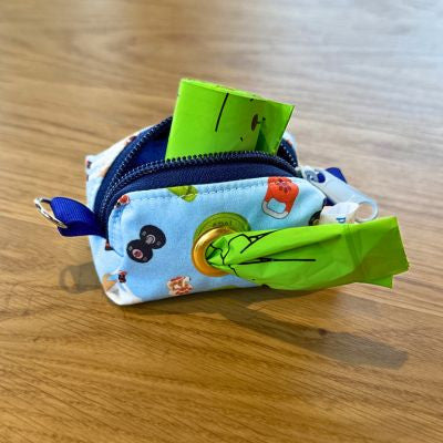 Sweat For Shelter Pets - Hands Free Dog Poop Bag Holder
